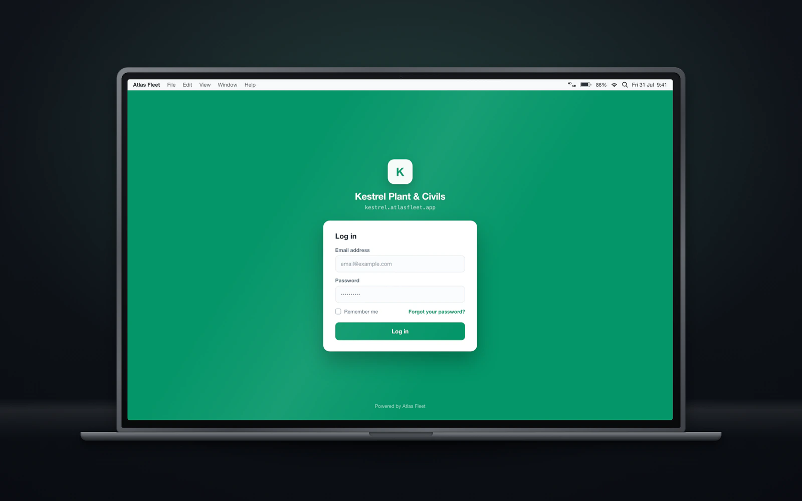 Laptop showing a login page flooded in a single brand color, with a white sign-in card and a company logo above it.